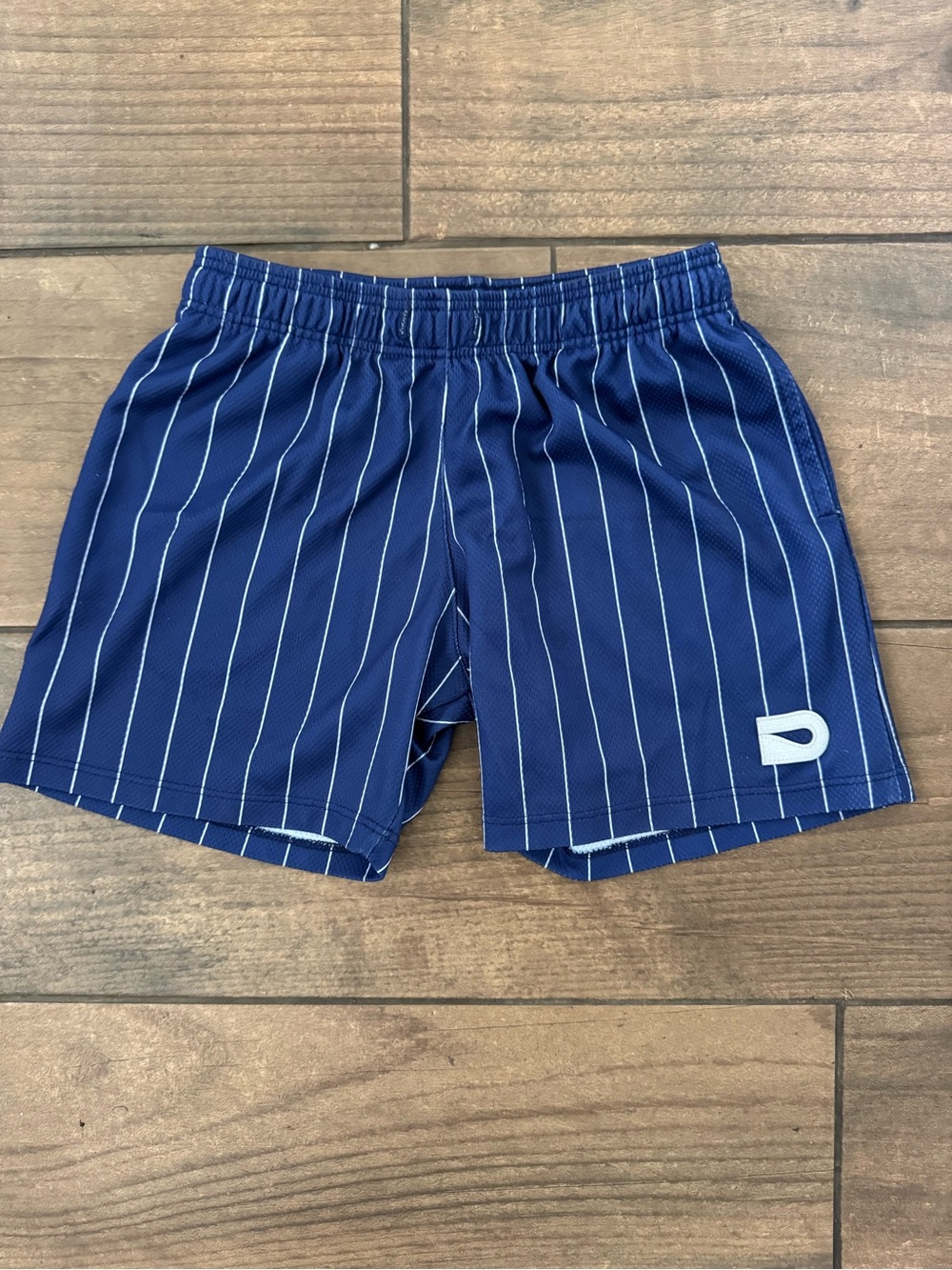 The Drip Shop Blue Pinstripe Athletic Shorts with White Logo